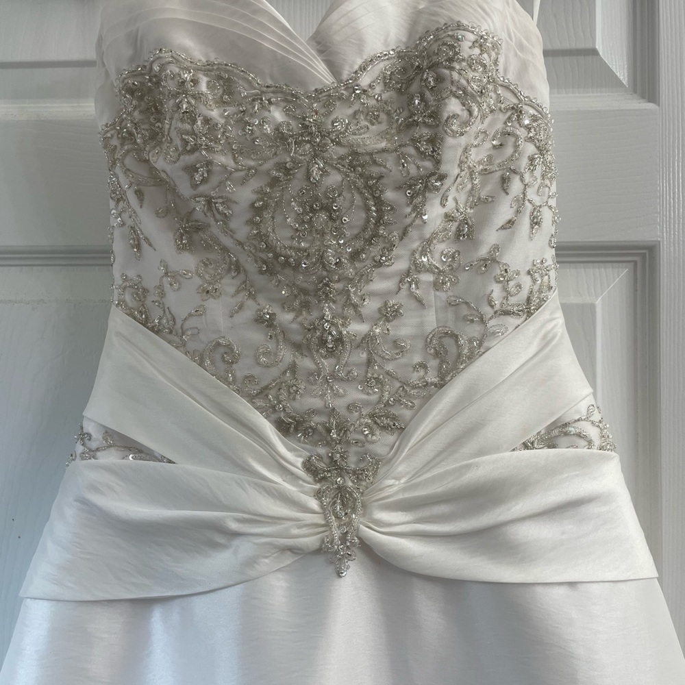Wedding dress used with extra material, beading and detachable straps